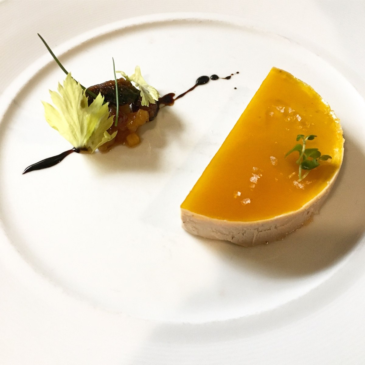 Terrine with bright gelée and a delicate garnish at Fleurie