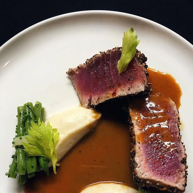 Seared ahi tuna with celery-root purée and sauce au poivre at Fleurie